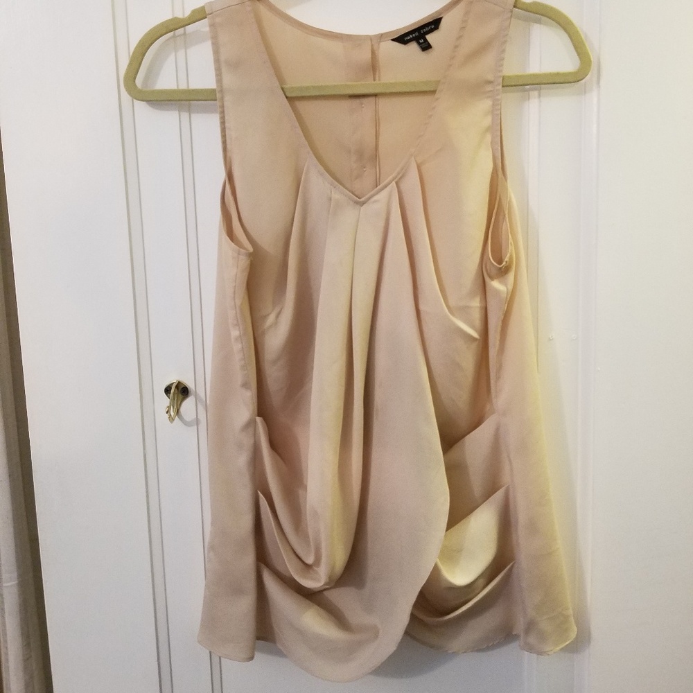Cream sleeveless blouse